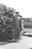 Genevieve Dooley, 1932 graduate, in her cap and gown.